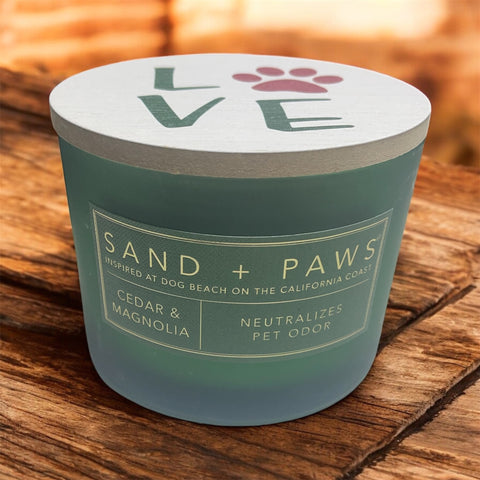sand and paws candle cedar and magnolia